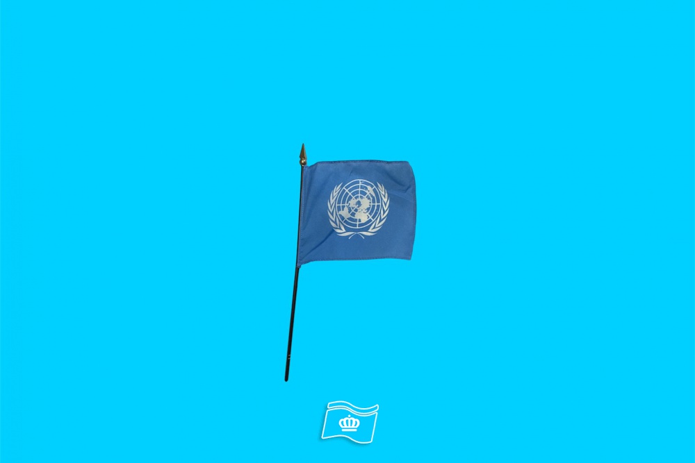 Tafelvlag Verenigde Naties + kunststof houder